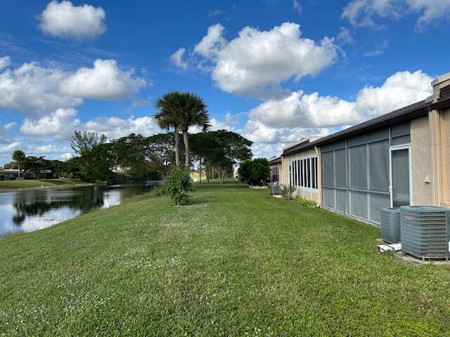 221 Lake Meryl Drive West Palm Beach, FL 33411 - Photo 18 of 31 a backyard of a house with lots of green space