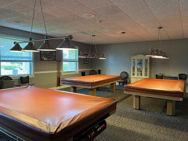 221 Lake Meryl Drive West Palm Beach, FL 33411 - Photo 24 of 31 a bedroom with two beds and a ceiling fan