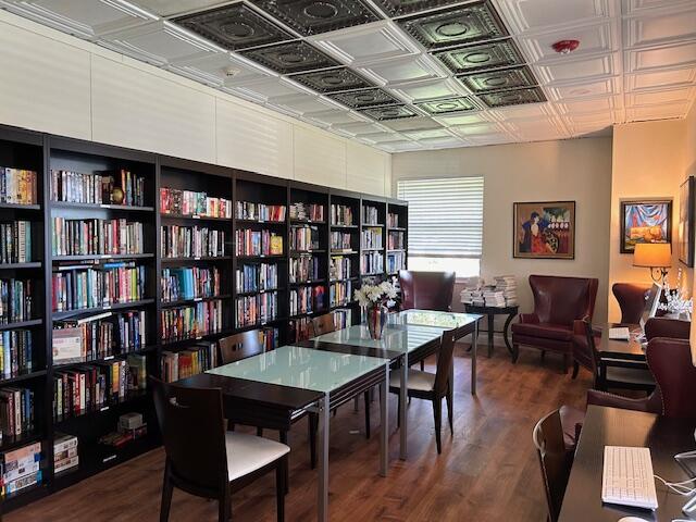 221 Lake Meryl Drive West Palm Beach, FL 33411 - Photo 29 of 31 a view of a livingroom with furniture and a bookshelf