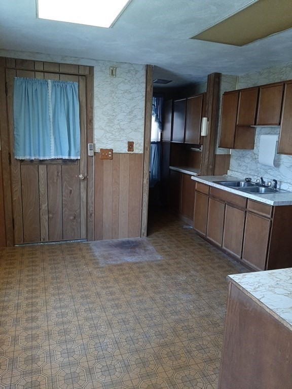 74 David Street Springfield, MA 01104 - Photo 5 of 12 a view of kitchen with cabinets