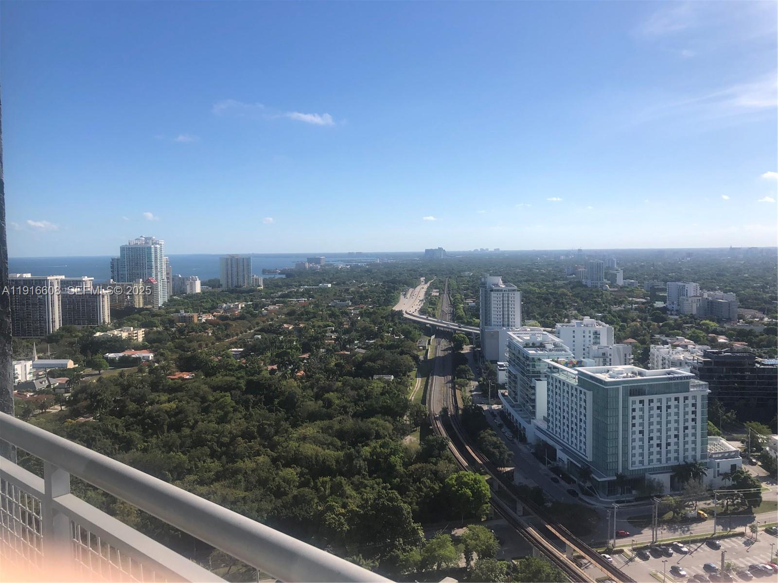 60 Southwest 13th Street, Unit 2803 Miami, FL 33130 - Photo 11 of 17 a view of a city from a balcony