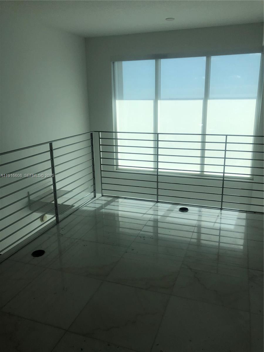 60 Southwest 13th Street, Unit 2803 Miami, FL 33130 - Photo 13 of 17 a view of a bathroom with a window