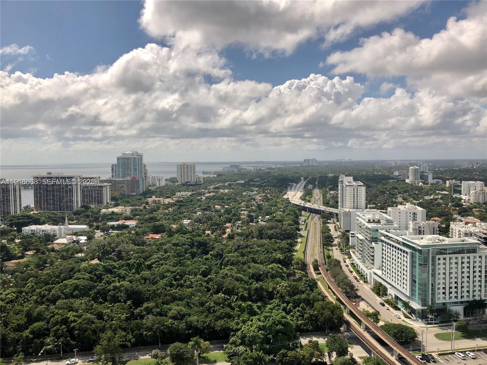 60 Southwest 13th Street, Unit 2803 Miami, FL 33130 - Photo 17 of 17 a view of a city with buildings