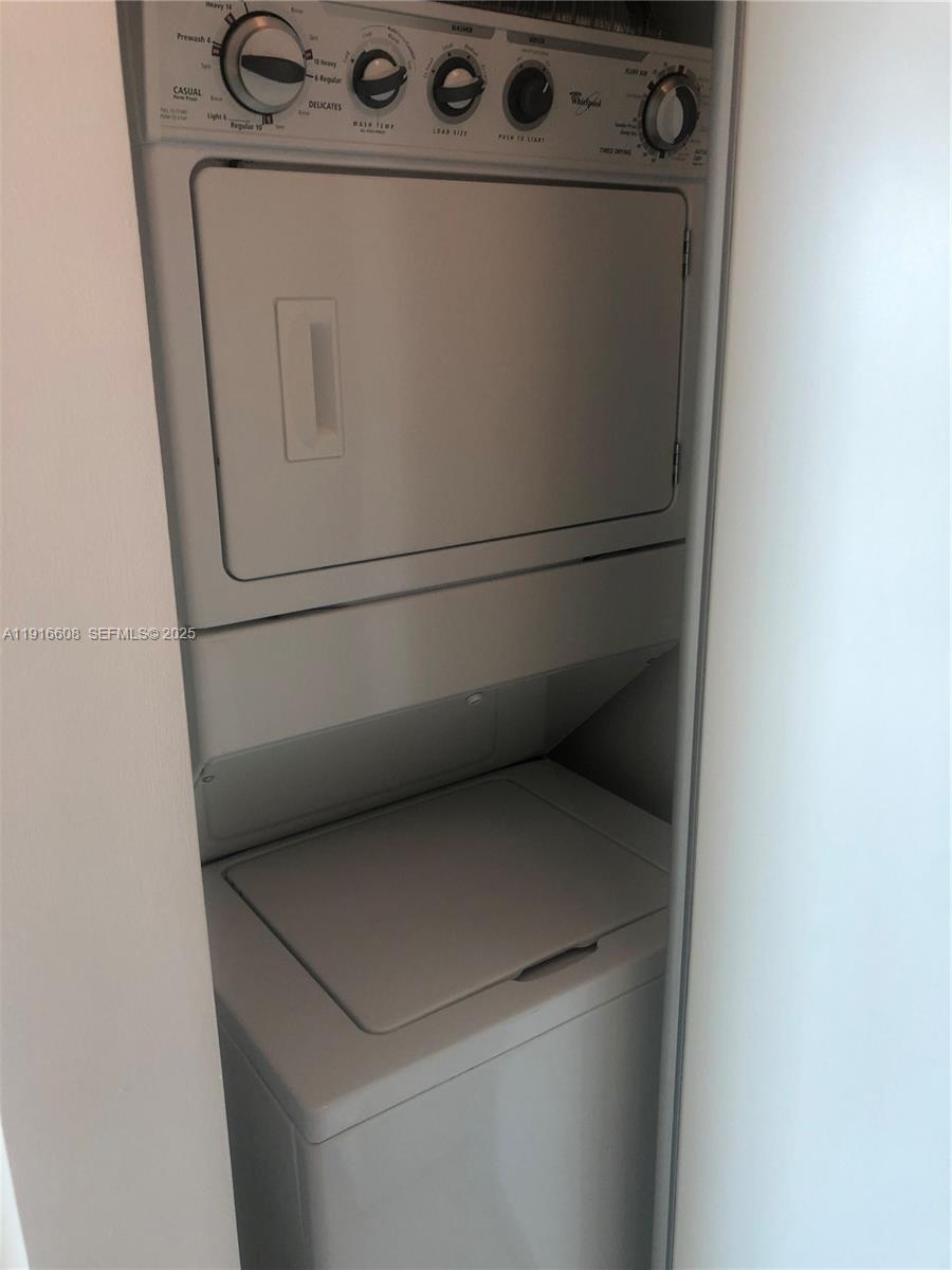 60 Southwest 13th Street, Unit 2803 Miami, FL 33130 - Photo 8 of 17 a close up view of washer and dryer