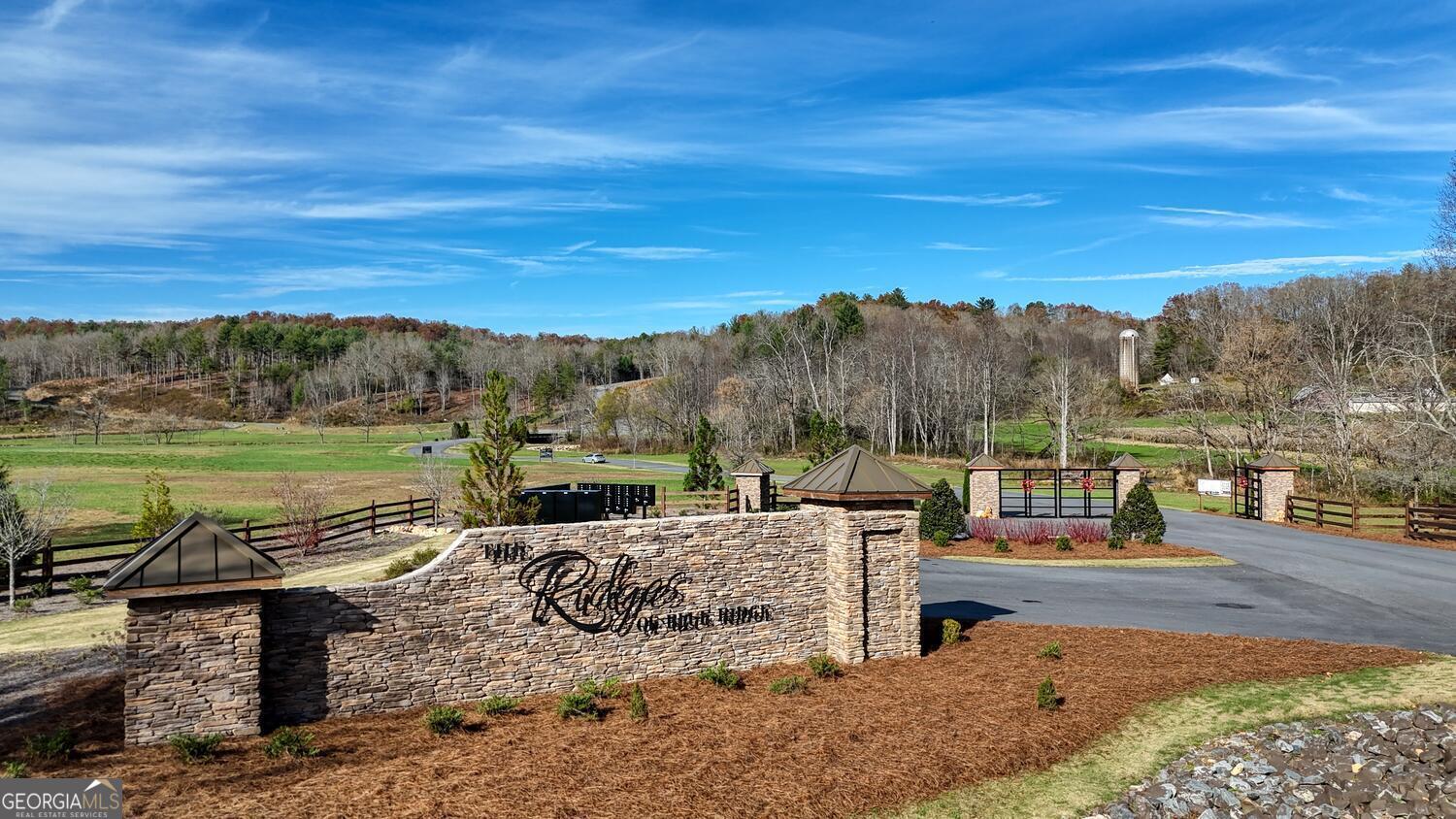 Lot 2 Ridge Drive Morganton, GA 30560 - Photo 15 of 24 a view of a lake with couches in the outdoor space
