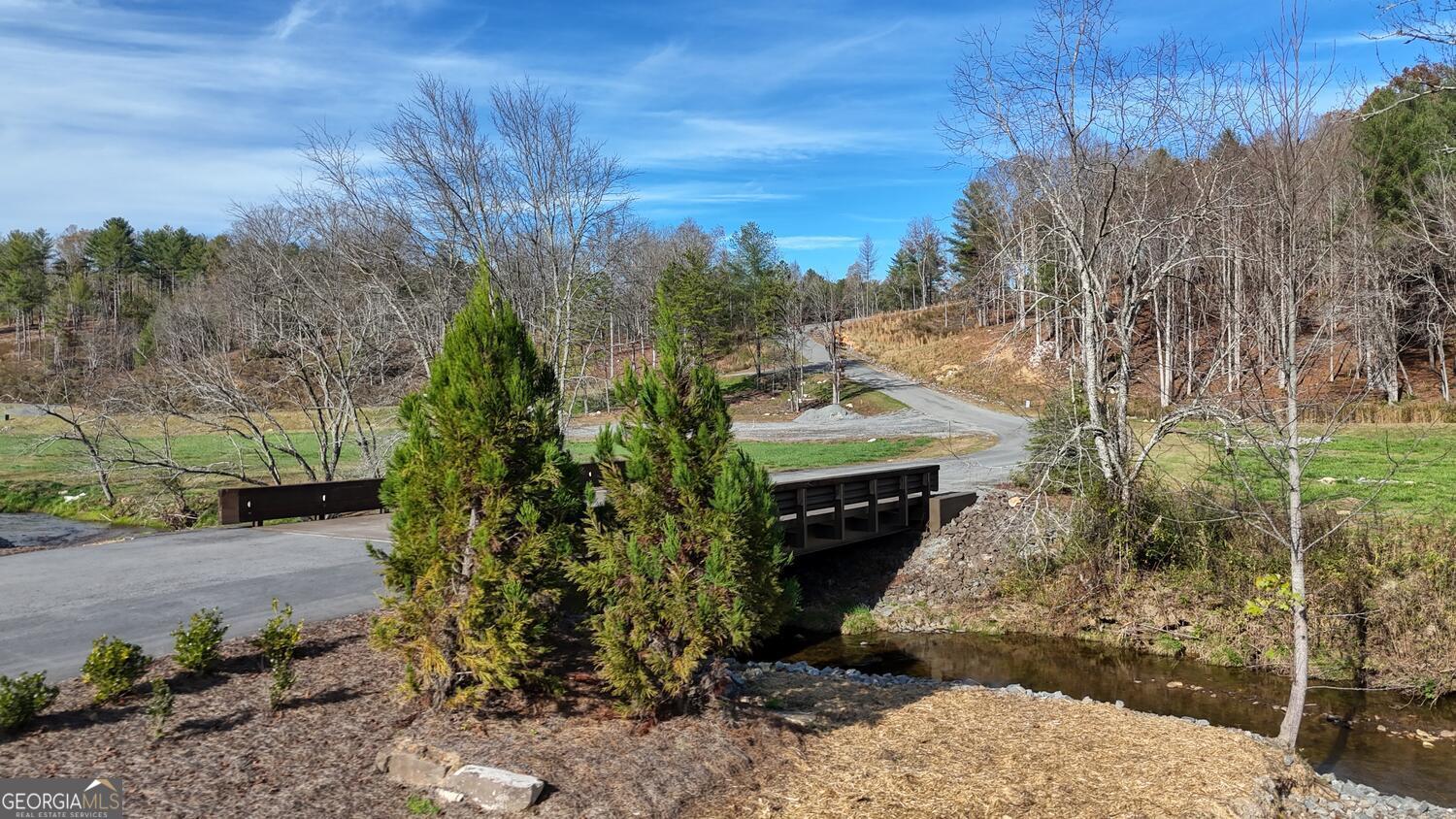 Lot 2 Ridge Drive Morganton, GA 30560 - Photo 20 of 24 a front view of a house with a yard