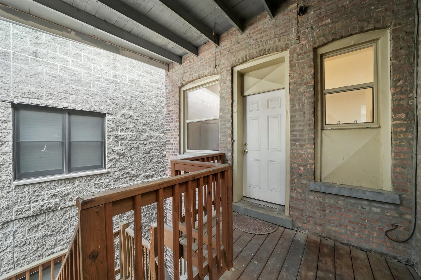 4845 North Harding Avenue, Unit 3 Chicago, IL 60625 - Photo 13 of 17 a view of a door and wooden floor