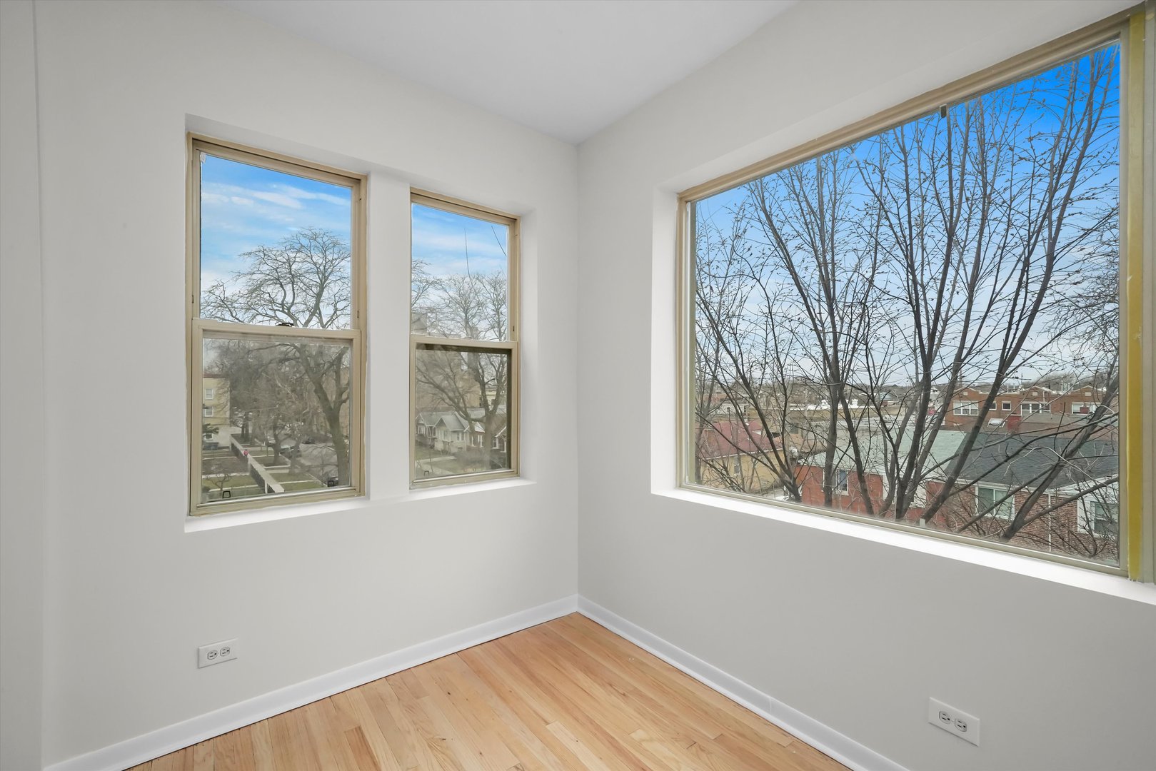 4845 North Harding Avenue, Unit 3 Chicago, IL 60625 - Photo 5 of 17 a view of a window in a room