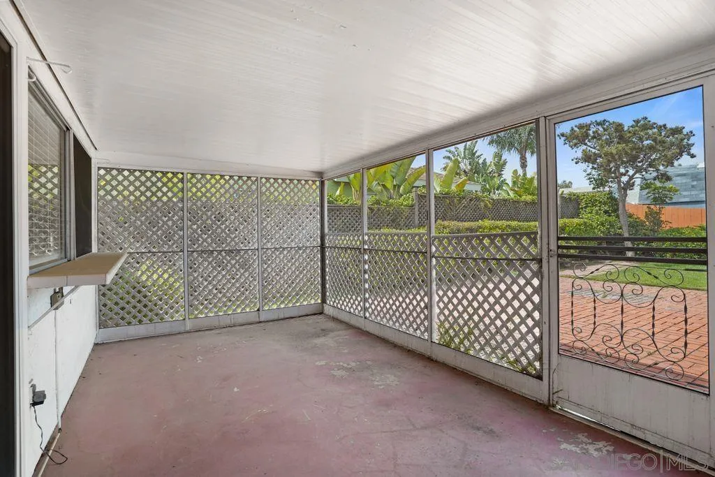750 Kostner Drive San Diego, CA 92154 - Photo 20 of 34 a view of a room with wooden floor and iron stairs