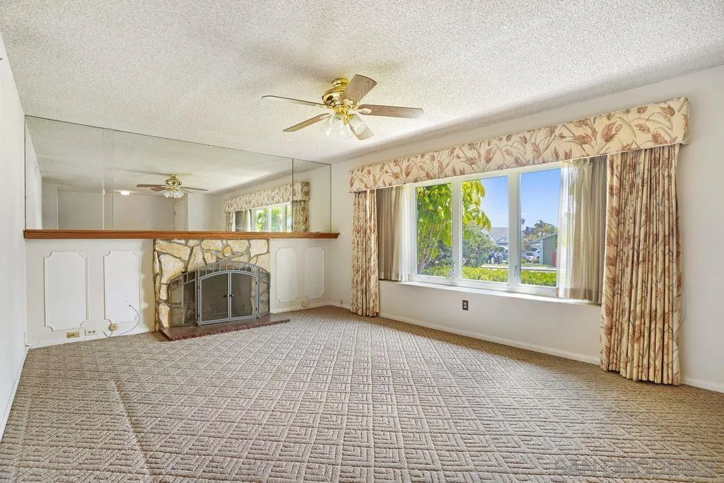 750 Kostner Drive San Diego, CA 92154 - Photo 2 of 34 a view of a kitchen with a sink and a window