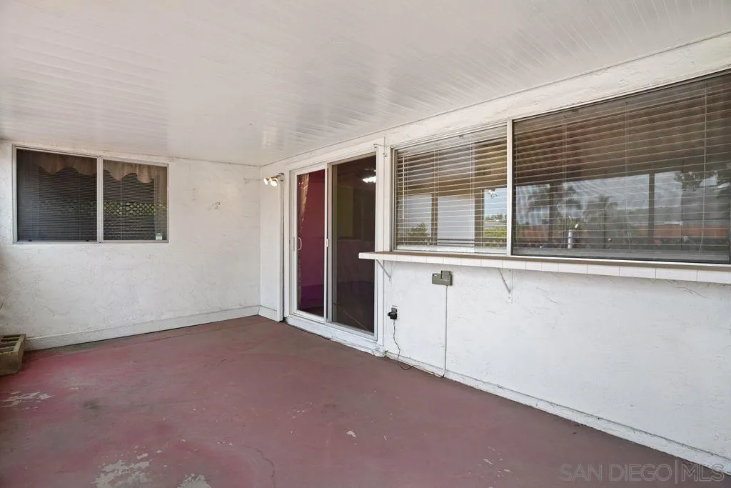 750 Kostner Drive San Diego, CA 92154 - Photo 21 of 34 an empty room with windows
