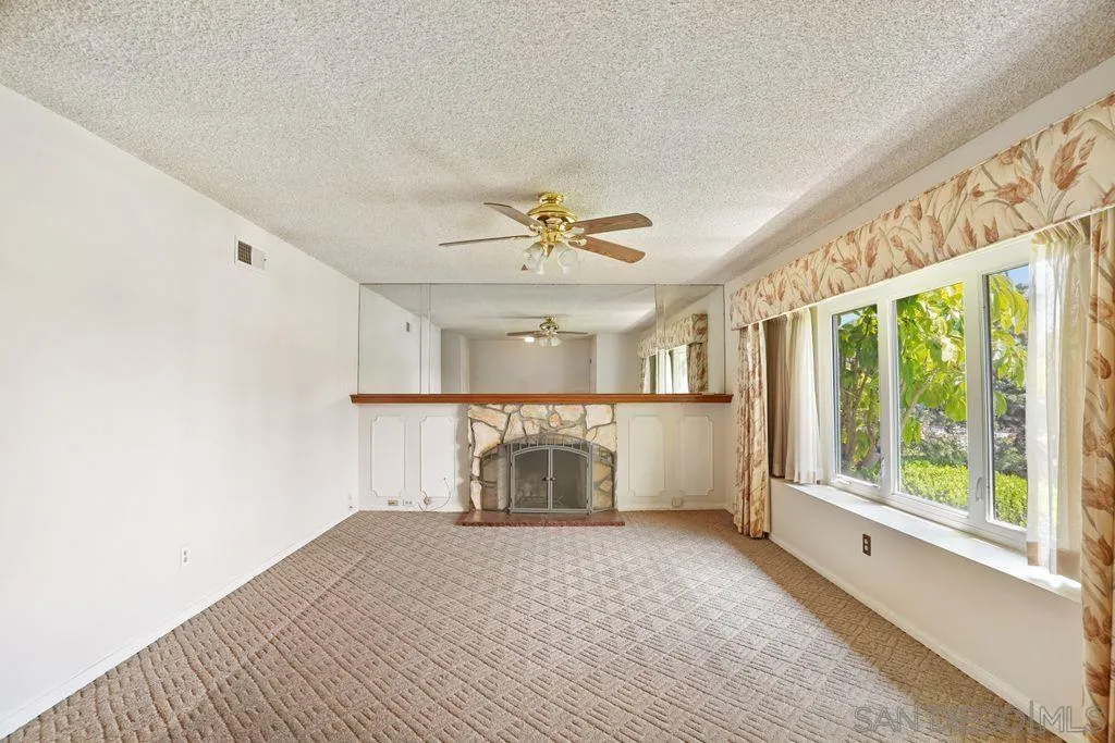 750 Kostner Drive San Diego, CA 92154 - Photo 3 of 34 a very nice looking room with a large window