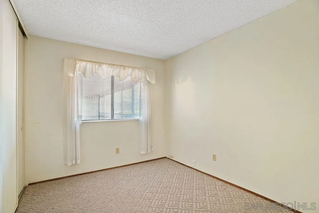 750 Kostner Drive San Diego, CA 92154 - Photo 9 of 34 a view of an empty room with a window