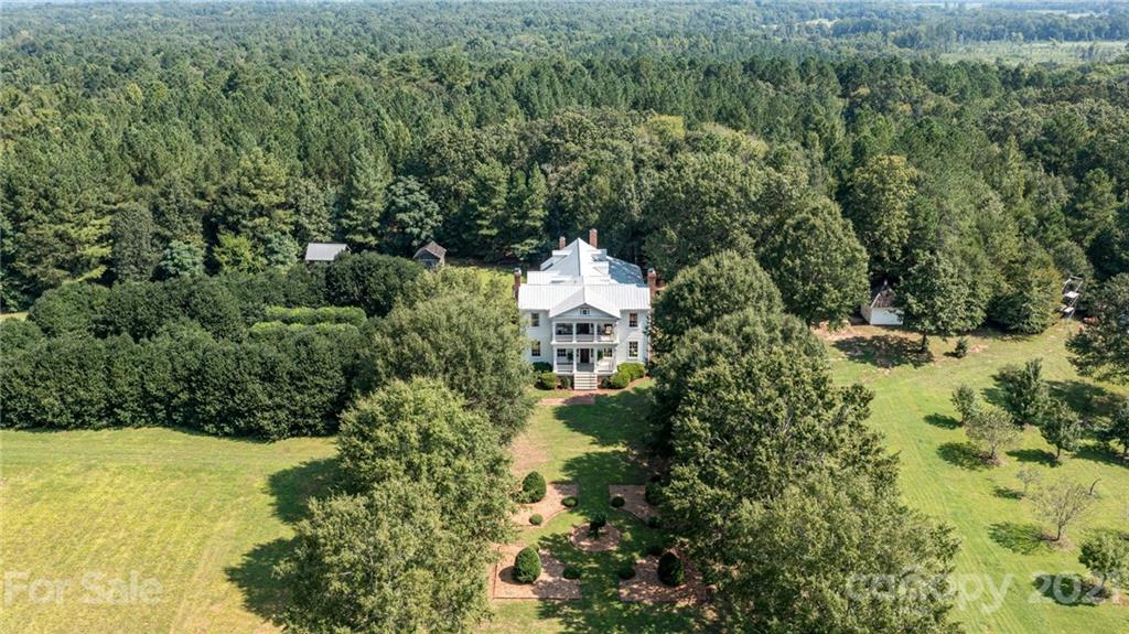 2539 Wooten Road Chester, SC 29706 - Photo 1 of 46 a aerial view of a house with a yard and lake view