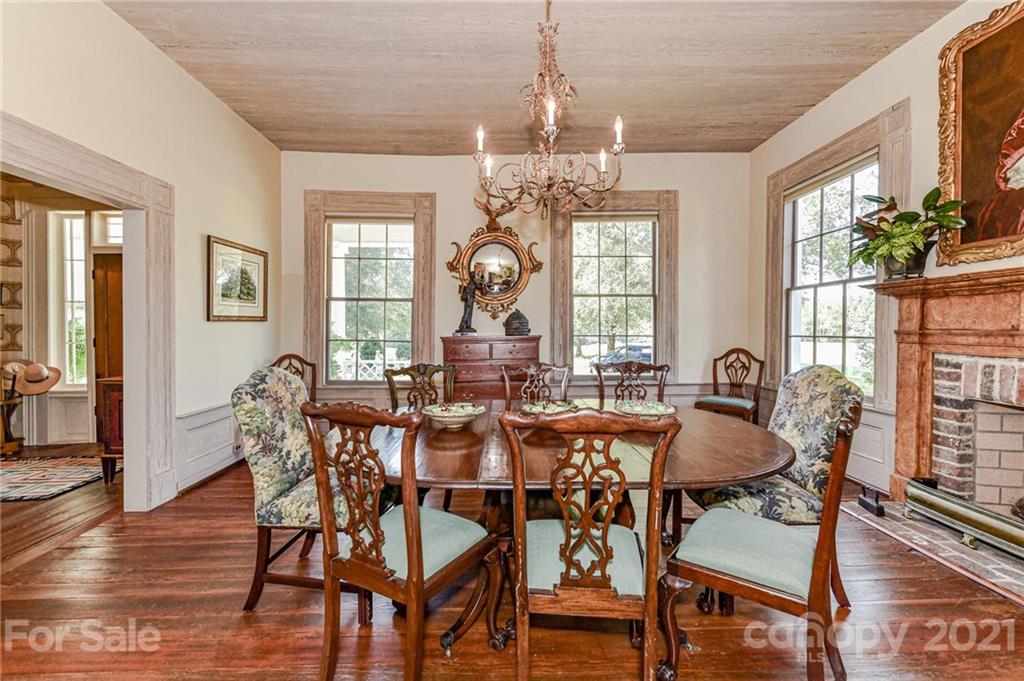 2539 Wooten Road Chester, SC 29706 - Photo 12 of 46 a view of a dining room with furniture wooden floor and chandelier