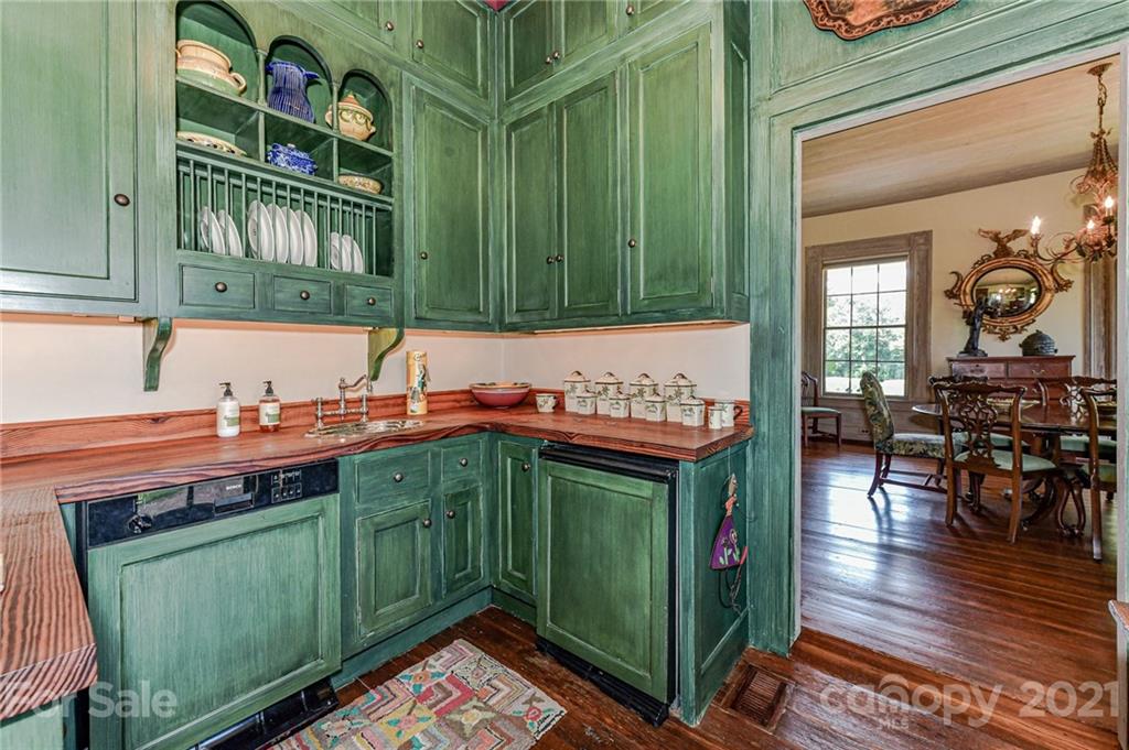 2539 Wooten Road Chester, SC 29706 - Photo 15 of 46 a room with cabinets and wooden floors