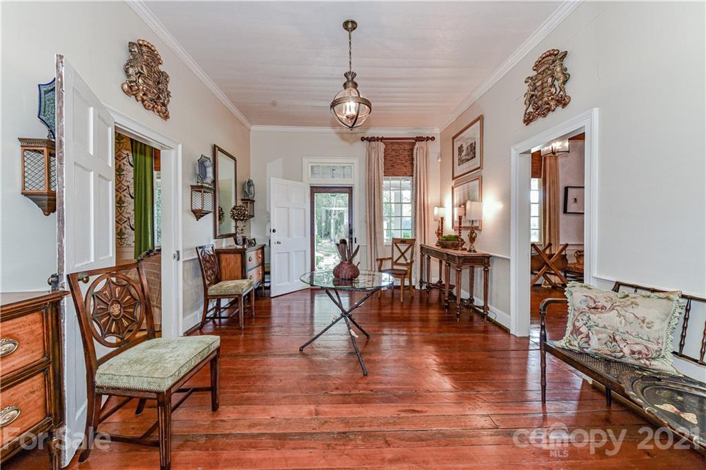 2539 Wooten Road Chester, SC 29706 - Photo 18 of 46 a living room with furniture dining table and a chandelier