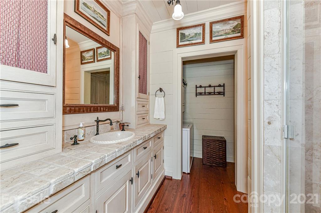 2539 Wooten Road Chester, SC 29706 - Photo 27 of 46 a bathroom with a granite countertop sink and a mirror