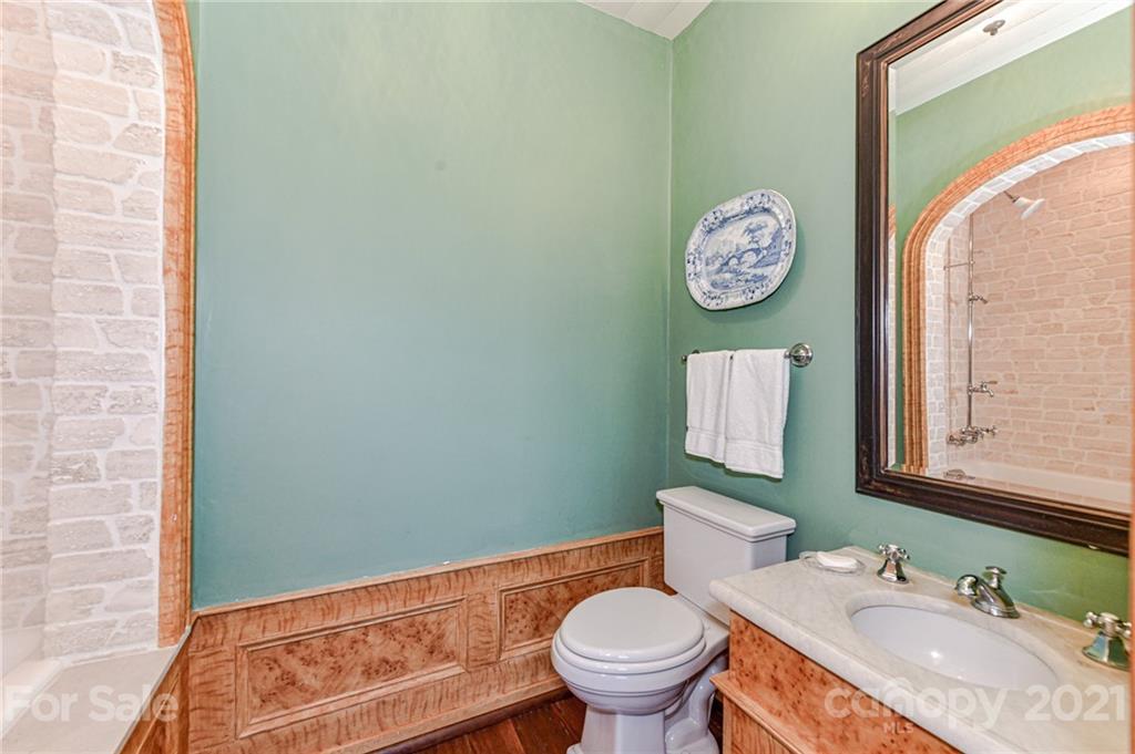 2539 Wooten Road Chester, SC 29706 - Photo 30 of 46 a bathroom with a toilet sink vanity and mirror
