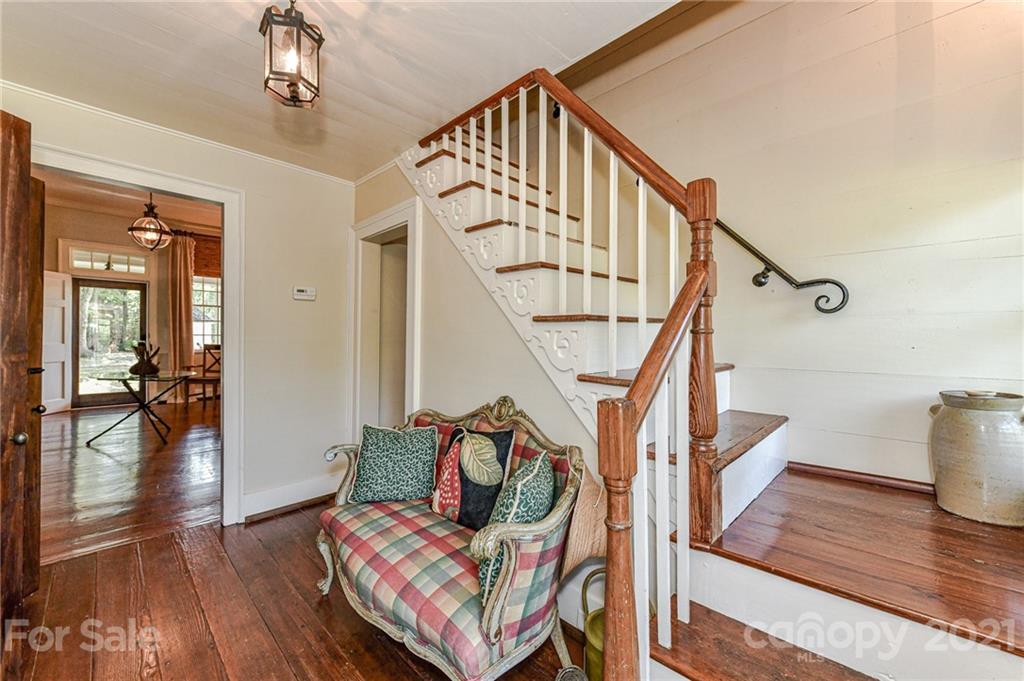 2539 Wooten Road Chester, SC 29706 - Photo 31 of 46 a living room with wooden floor and stairs