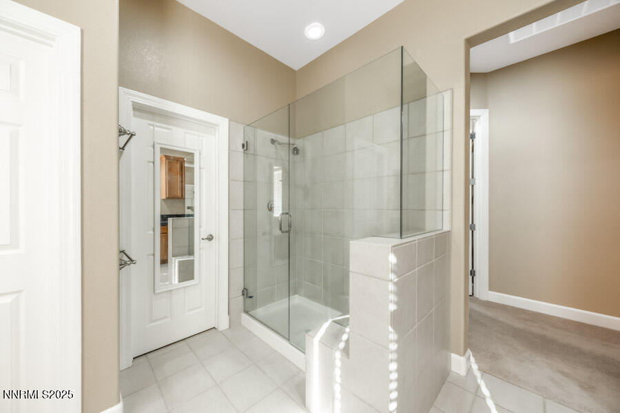 3240 Quartzite Drive Reno, NV 89523 - Photo 21 of 45 a bathroom with a shower and a sink