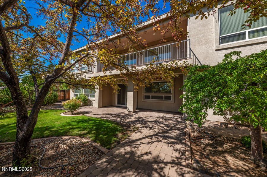 3240 Quartzite Drive Reno, NV 89523 - Photo 36 of 45 a front view of a house with a yard and garage