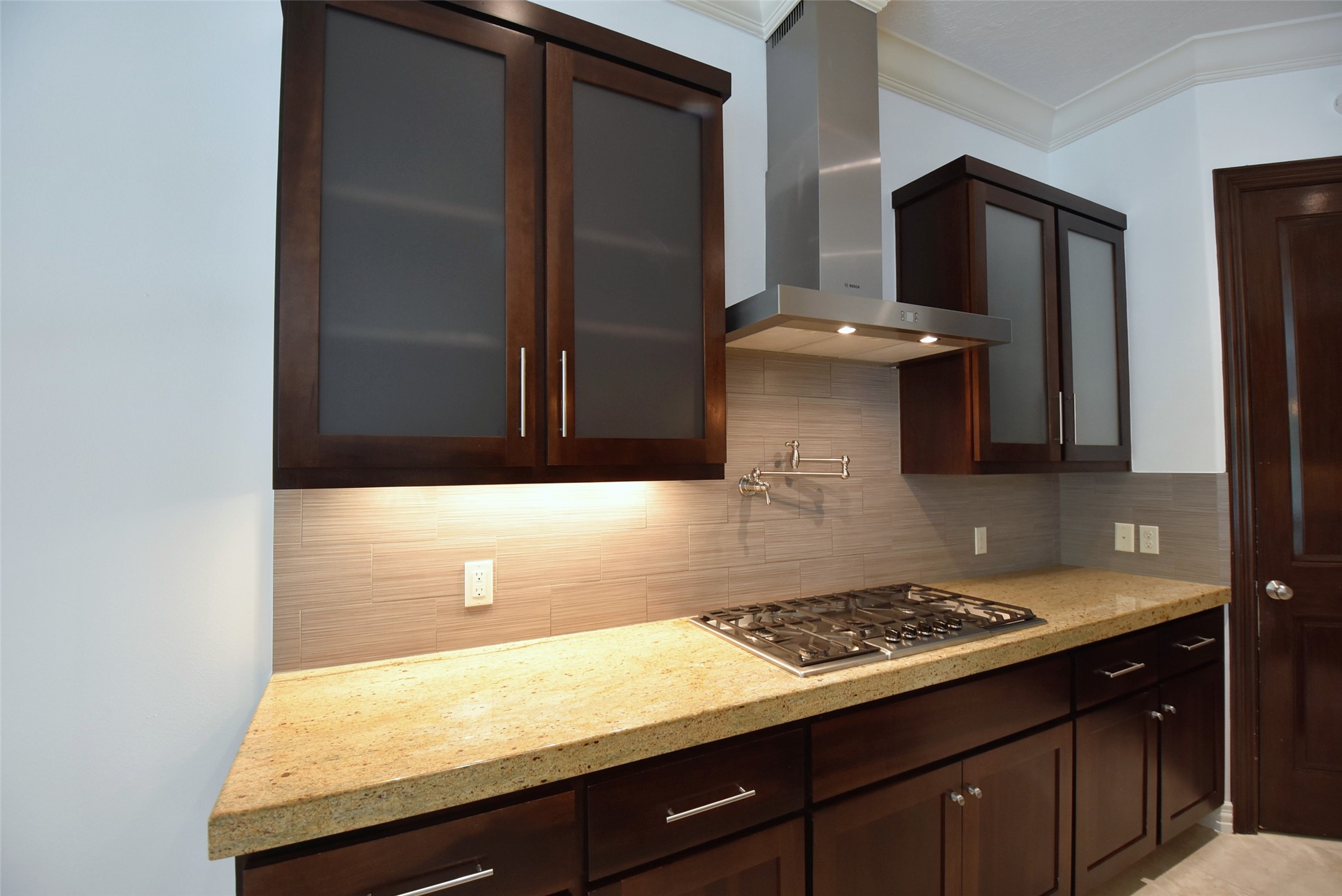 2014 Split Branch Court Houston, TX 77077 - Photo 10 of 47 a kitchen with a sink and a stove top oven