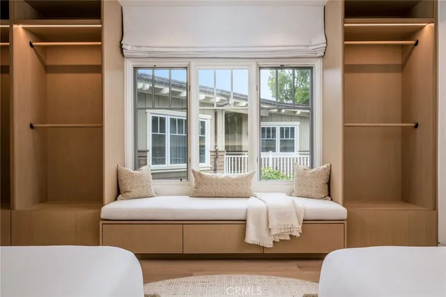 a bathroom with a tub shower vanity and a sink