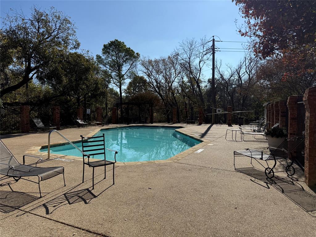167 Merlin Way Euless, TX 76039 - Photo 16 of 18 a view of a backyard with sitting area