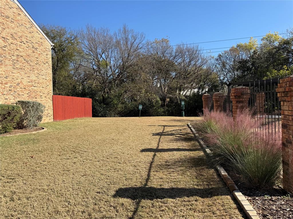 167 Merlin Way Euless, TX 76039 - Photo 17 of 18 a view of a yard