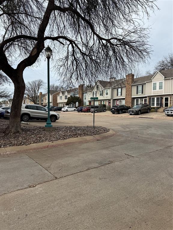 167 Merlin Way Euless, TX 76039 - Photo 18 of 18 a street view with residential house