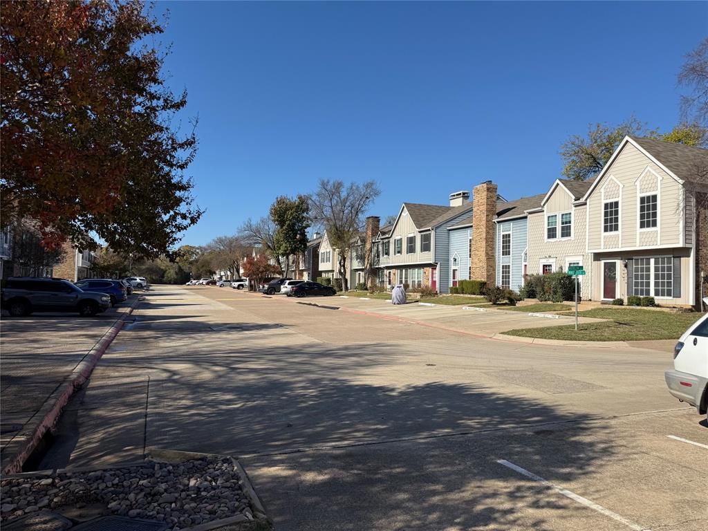 167 Merlin Way Euless, TX 76039 - Photo 2 of 18 a view of city street with a house