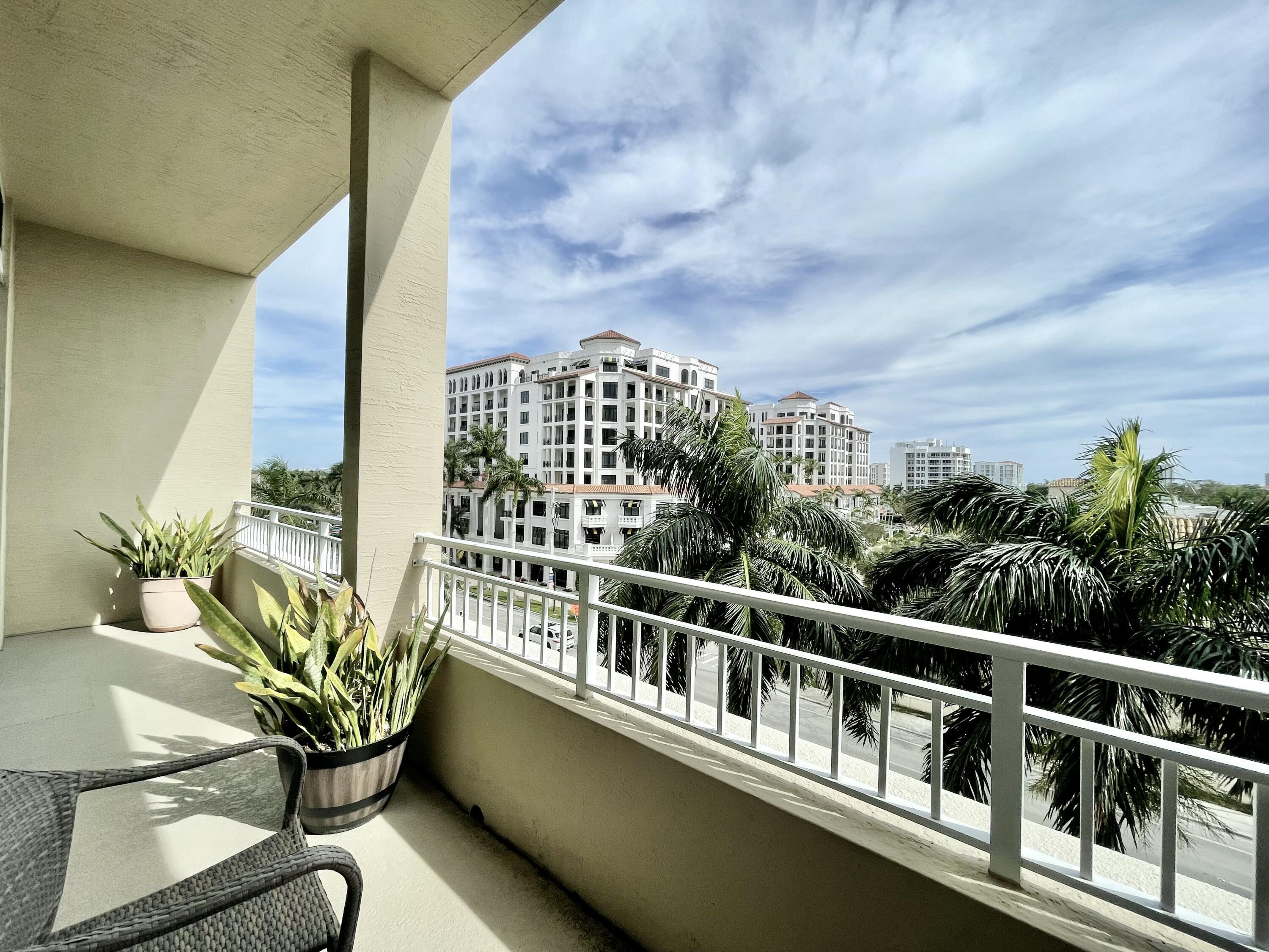 99 Southeast Mizner Boulevard, Unit 509 Boca Raton, FL 33432 - Photo 10 of 28 a view of a balcony with chairs