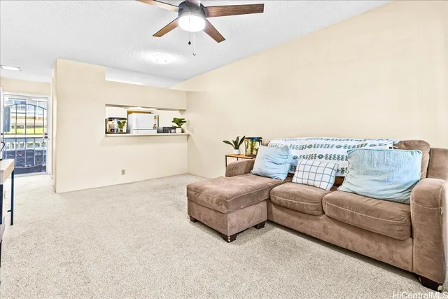 a living room with furniture and a couch