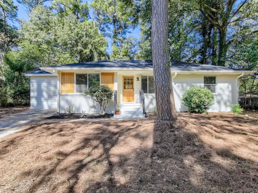 2156 Trailwood Road Decatur, GA 30032 - Photo 1 of 1 front view of a house with a patio
