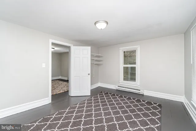 a view of empty room with windows