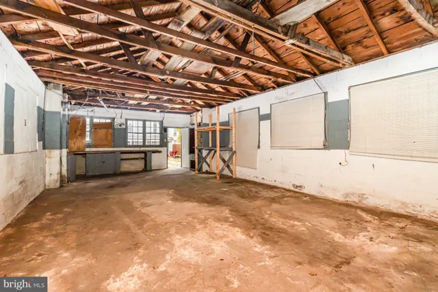 a view of a room with wooden walls
