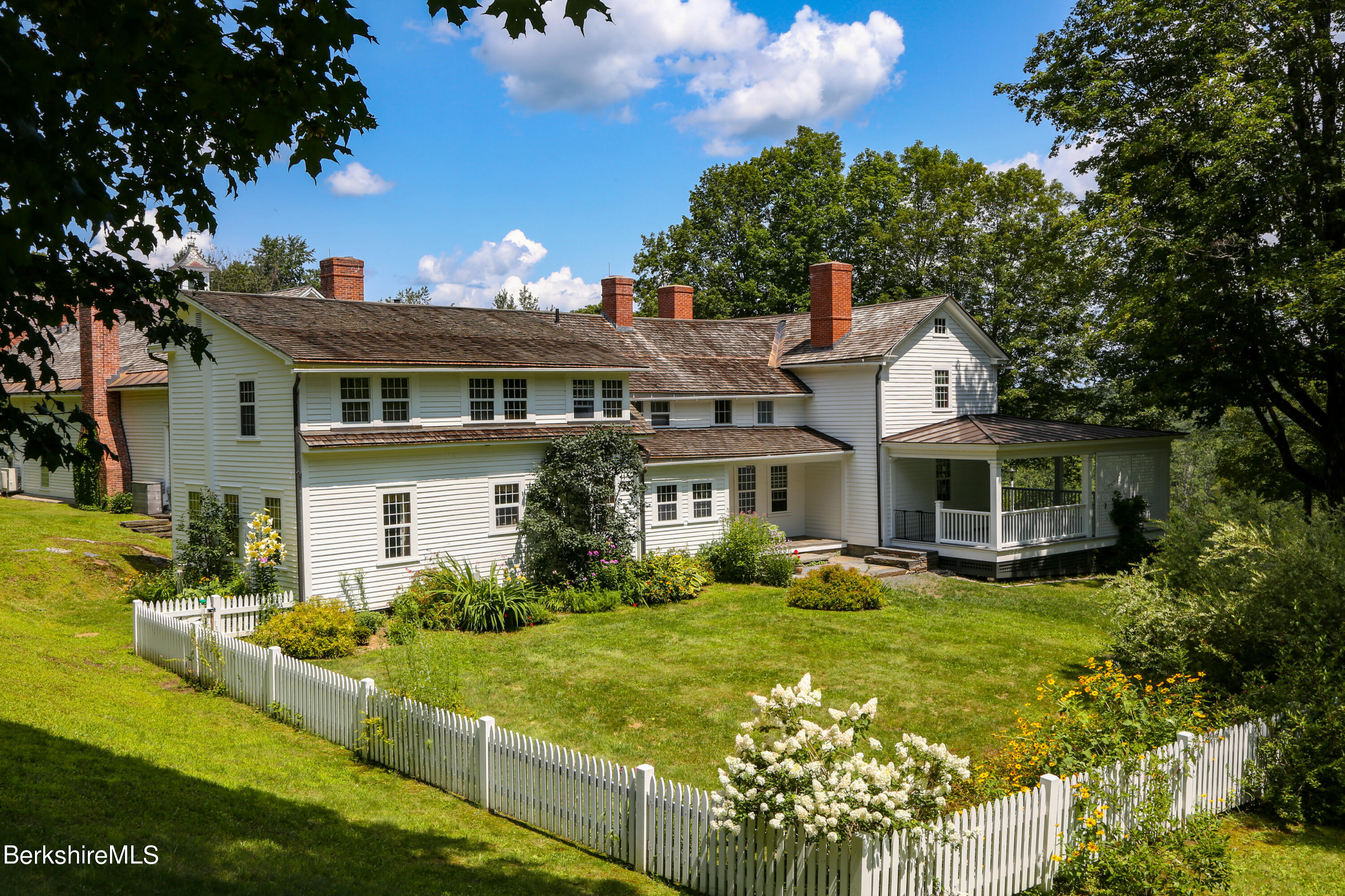 369 Bullitt Road Ashfield, MA 01330 - Photo 17 of 50 a front view of a house with garden