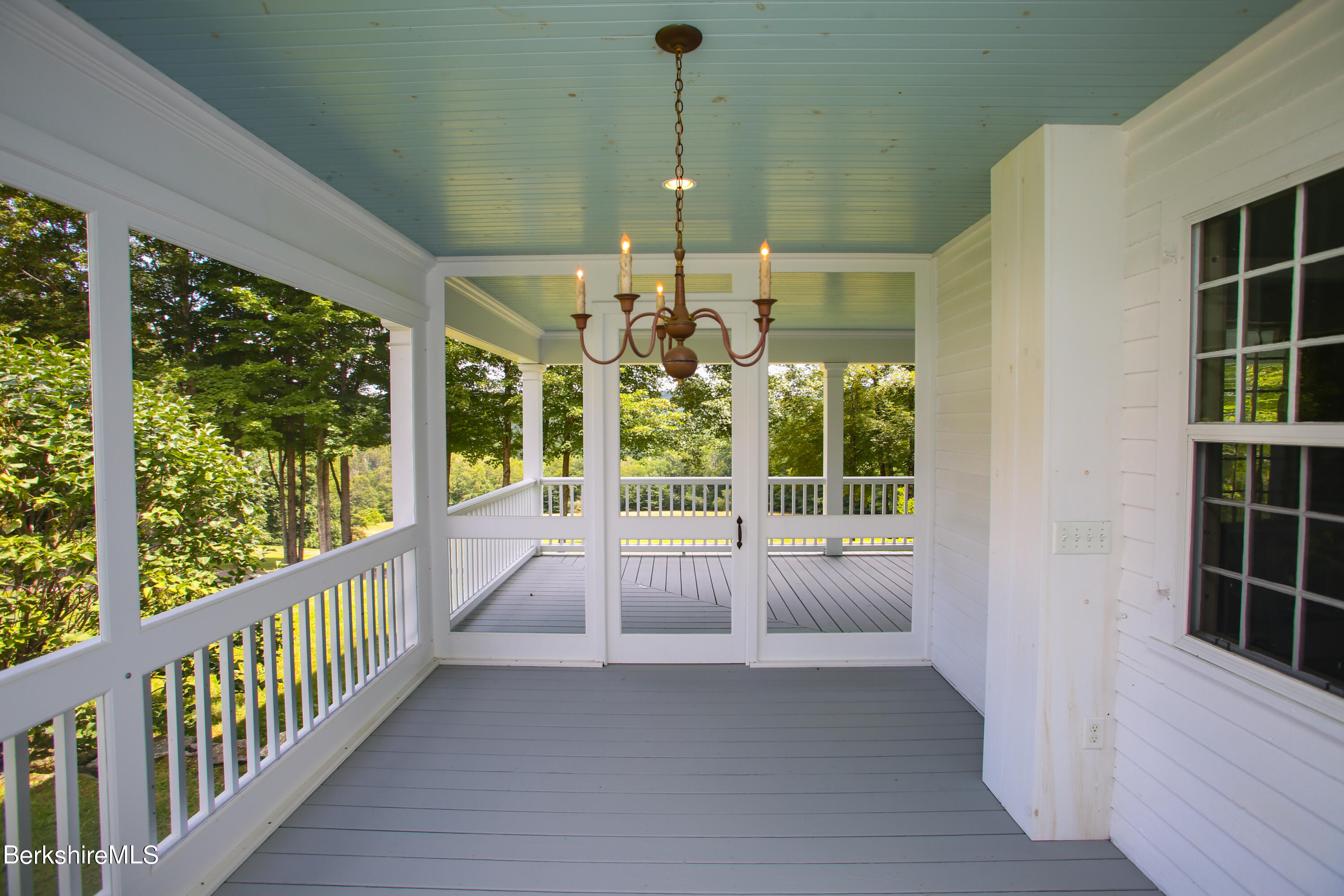 369 Bullitt Road Ashfield, MA 01330 - Photo 21 of 50 a view of a room with windows and cabinet