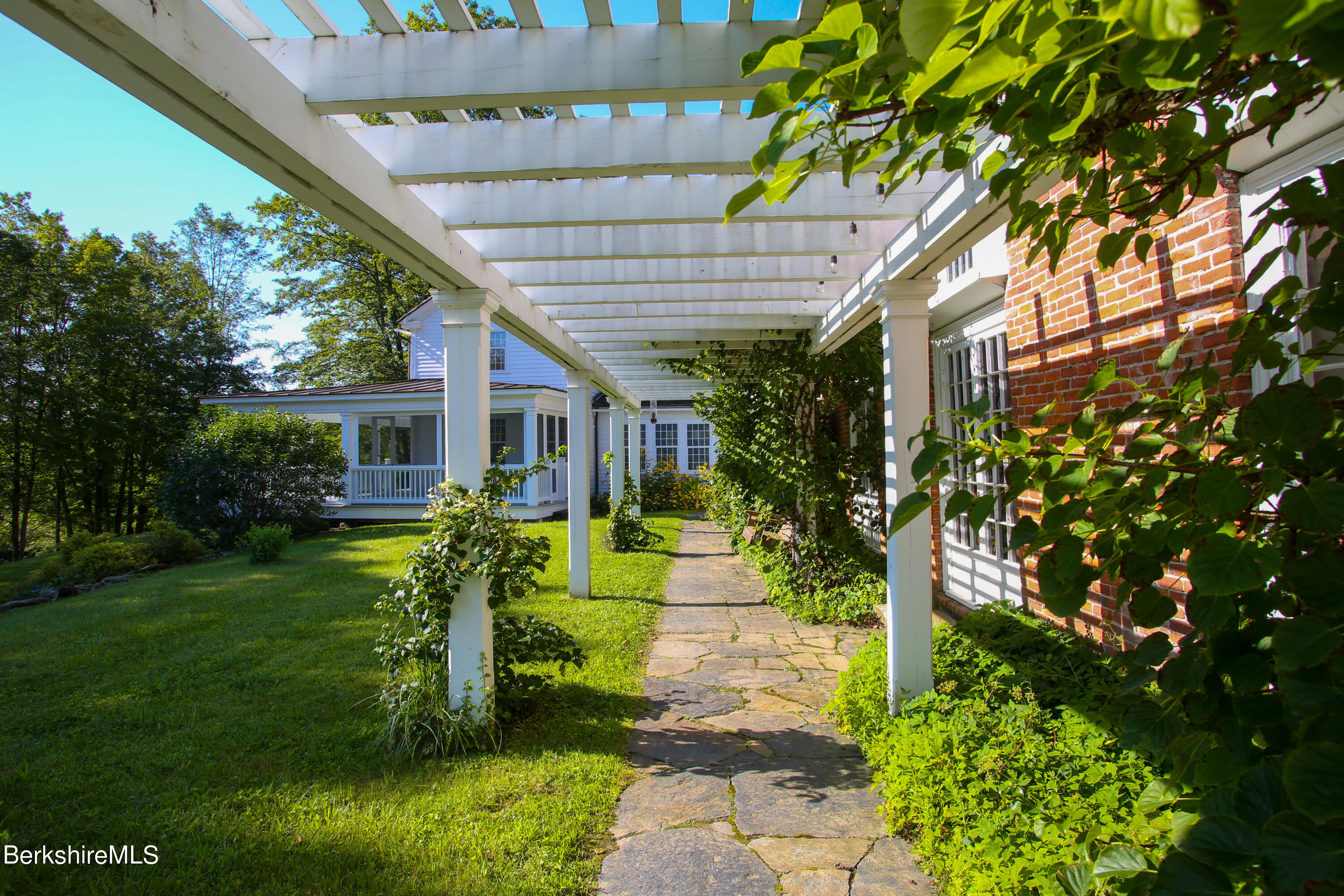 369 Bullitt Road Ashfield, MA 01330 - Photo 28 of 50 a view of a house with a big yard plants and large tree