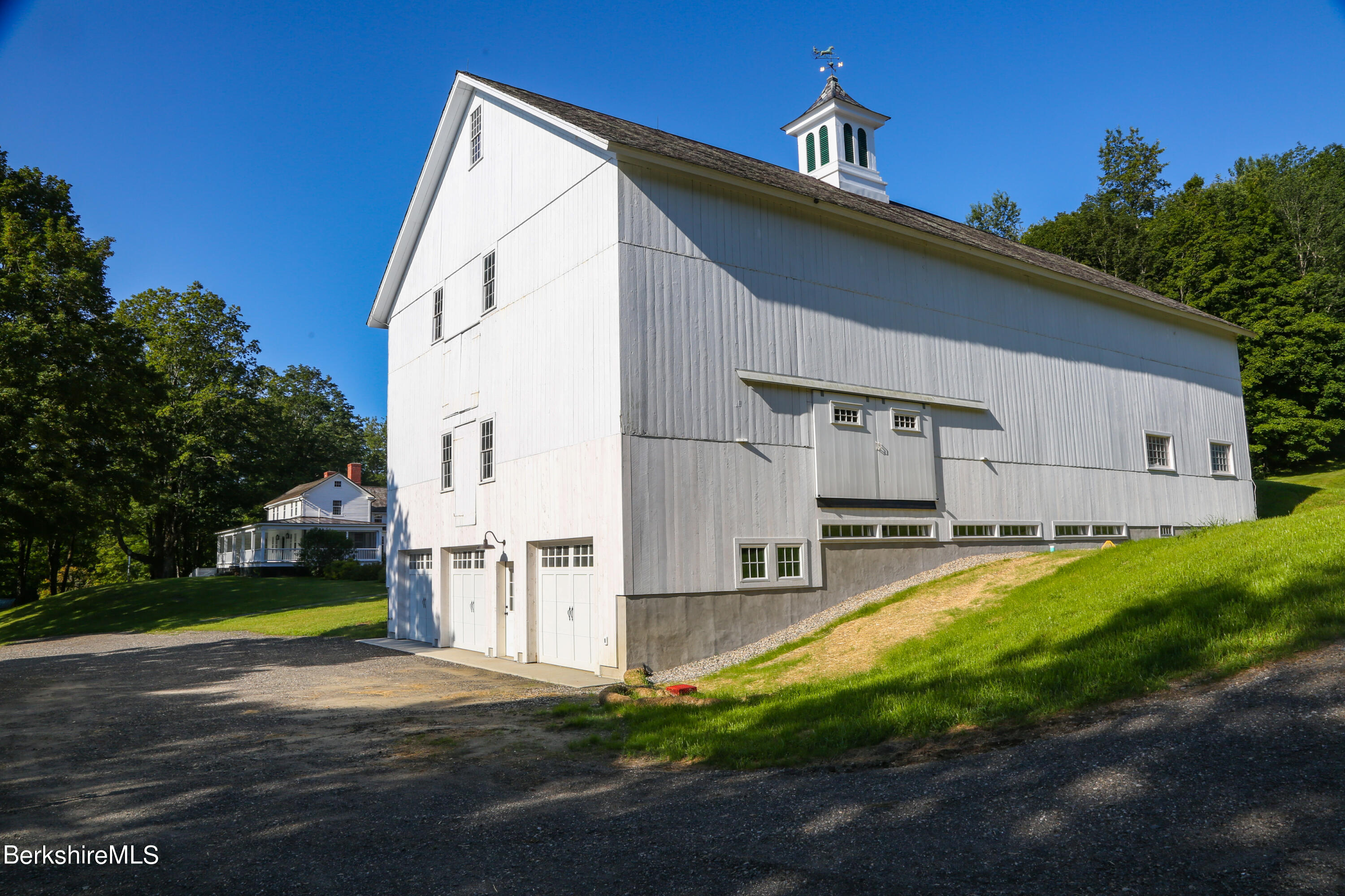 369 Bullitt Road Ashfield, MA 01330 - Photo 39 of 50 a view of a house with backyard and trees