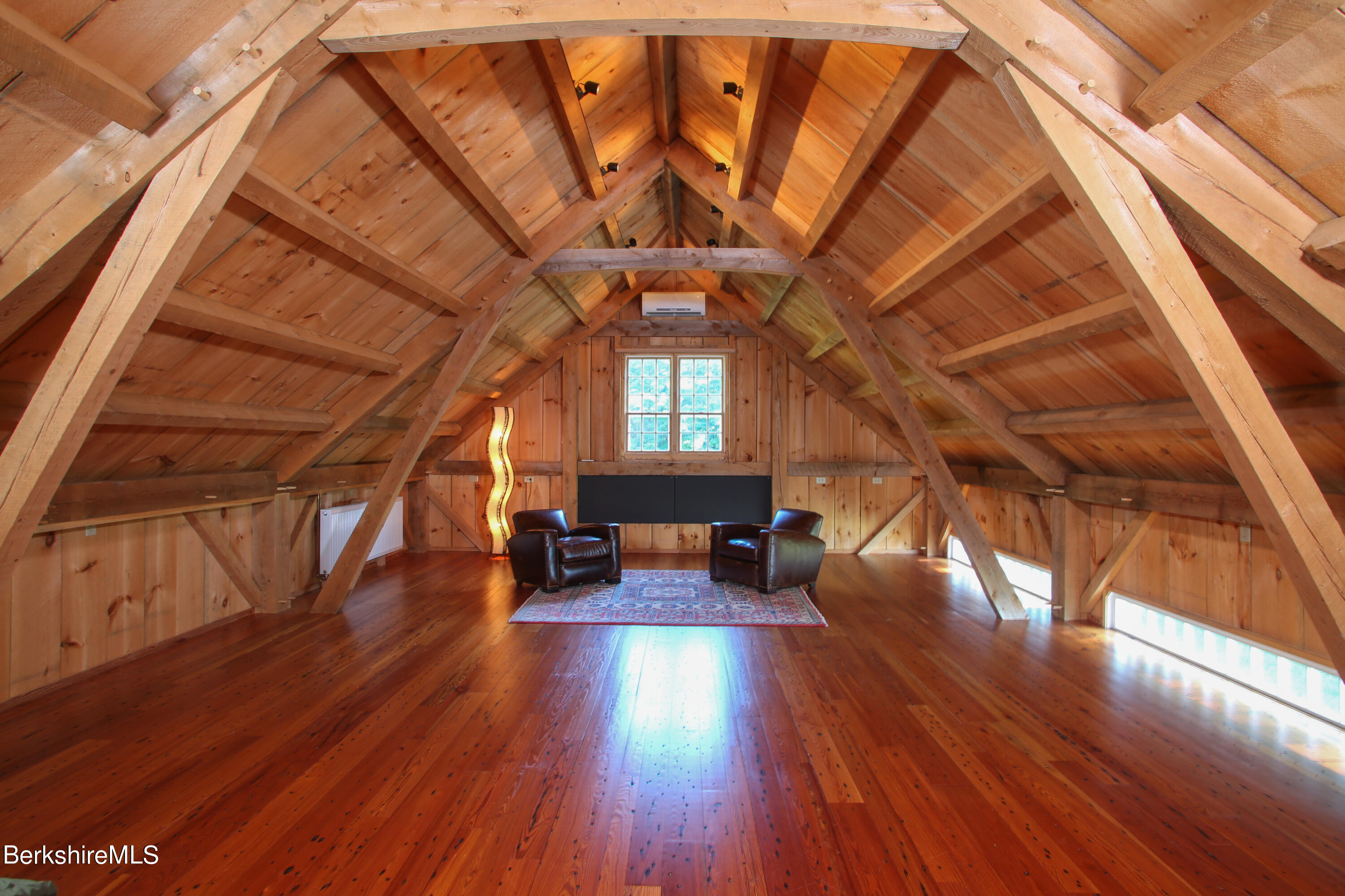 369 Bullitt Road Ashfield, MA 01330 - Photo 44 of 50 a very nice looking room with wooden floors and stairs