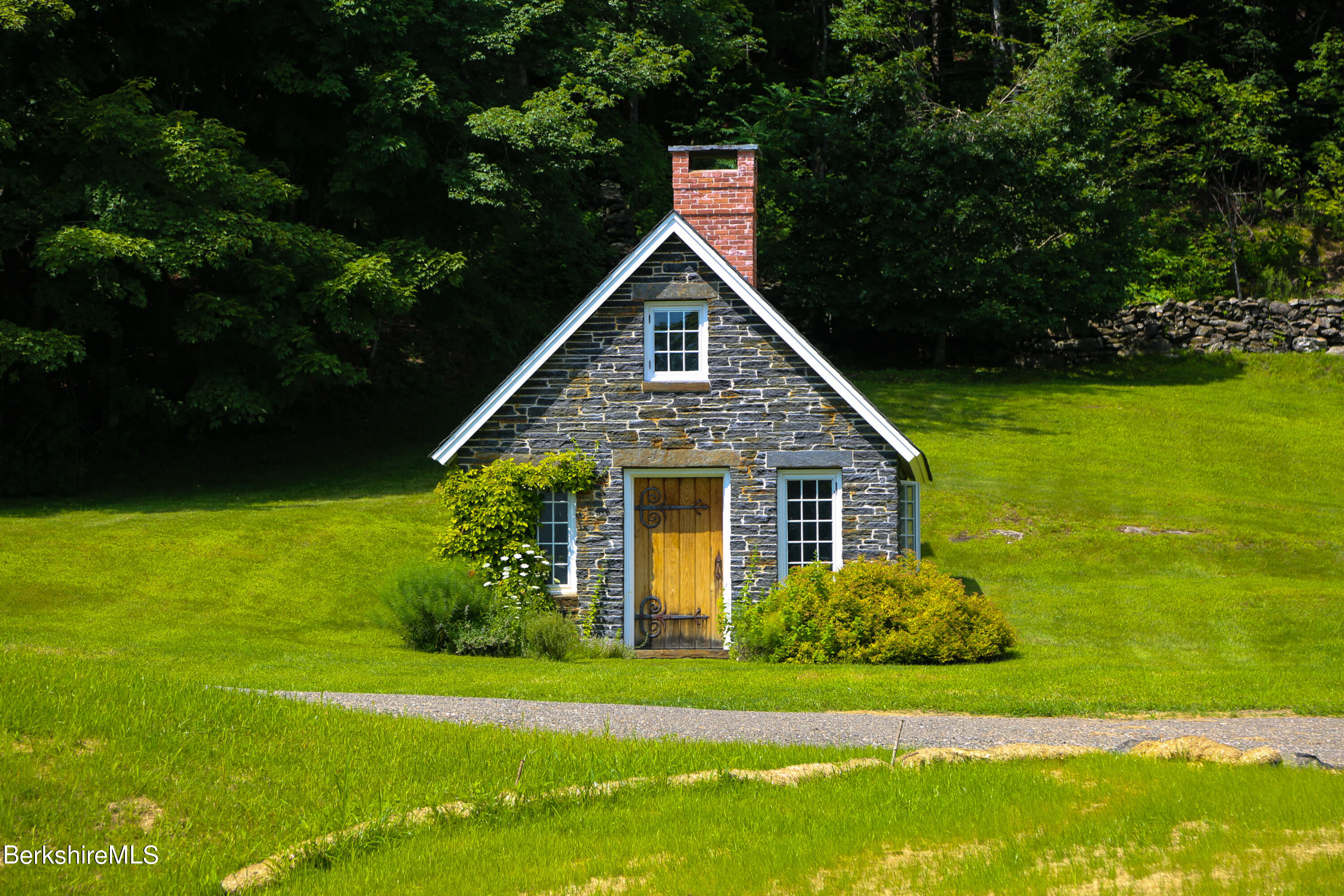 369 Bullitt Road Ashfield, MA 01330 - Photo 45 of 50 a view of a big yard with plants and large trees