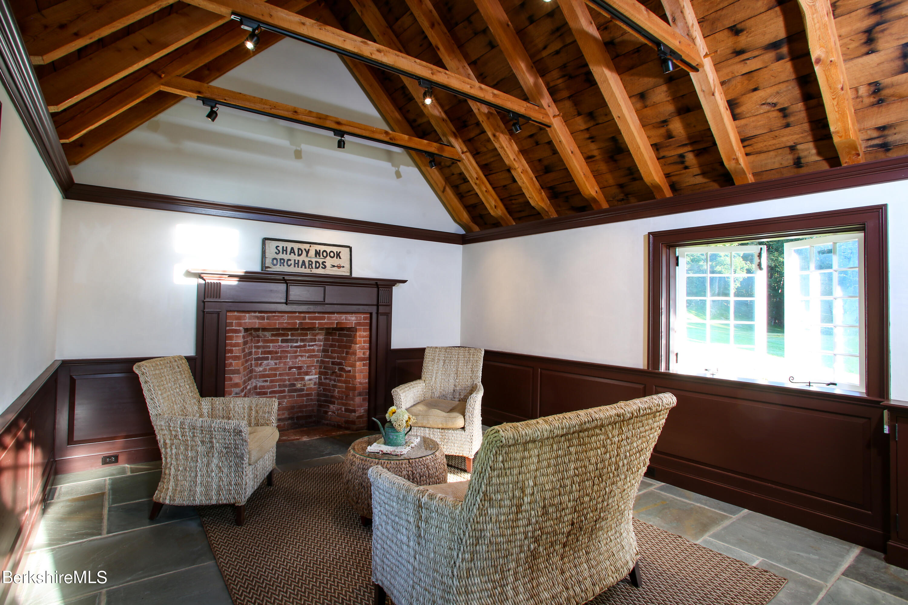 369 Bullitt Road Ashfield, MA 01330 - Photo 46 of 50 a living room with furniture and a fireplace