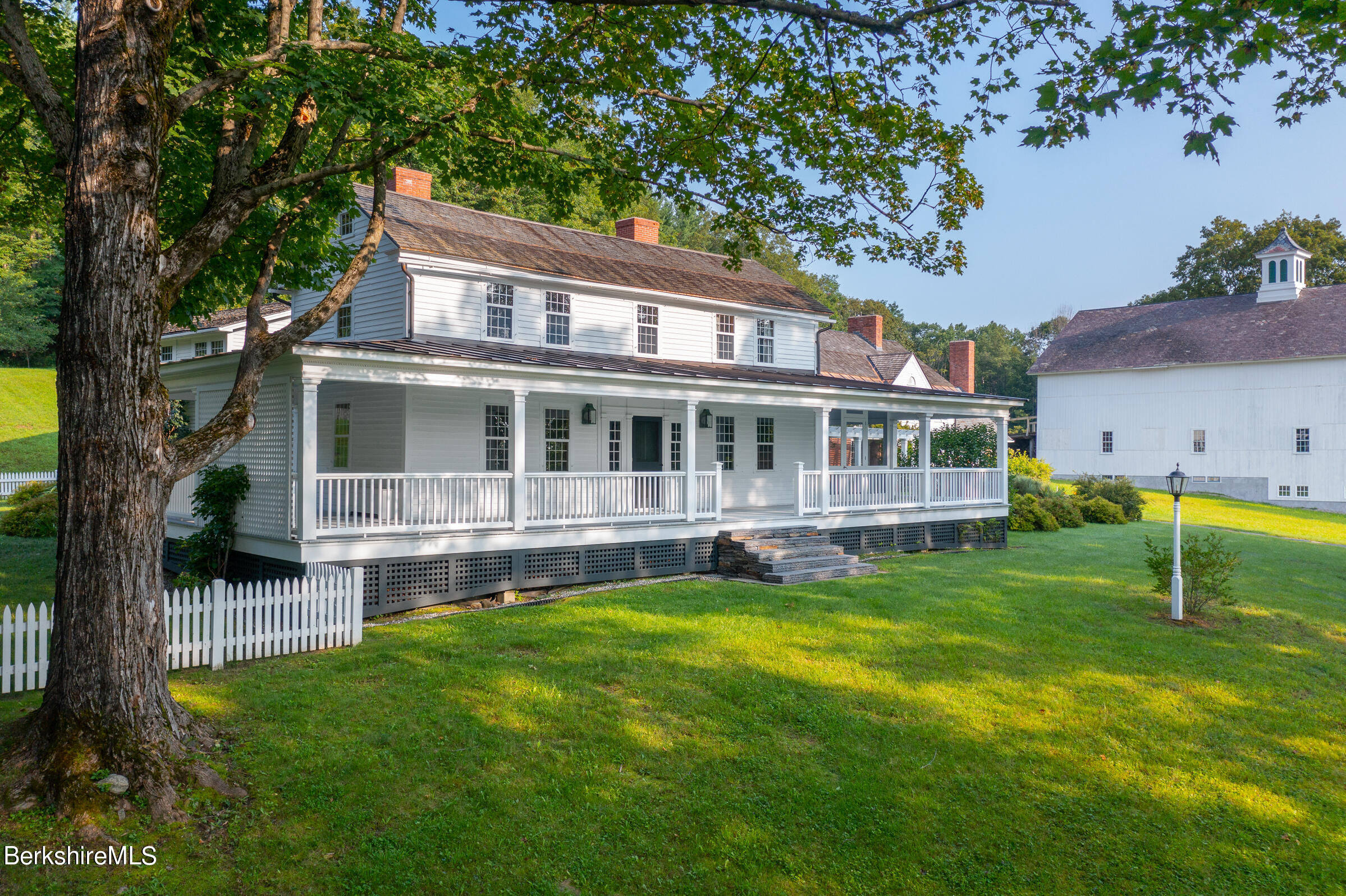 369 Bullitt Road Ashfield, MA 01330 - Photo 6 of 50 a house view with a sitting space and garden