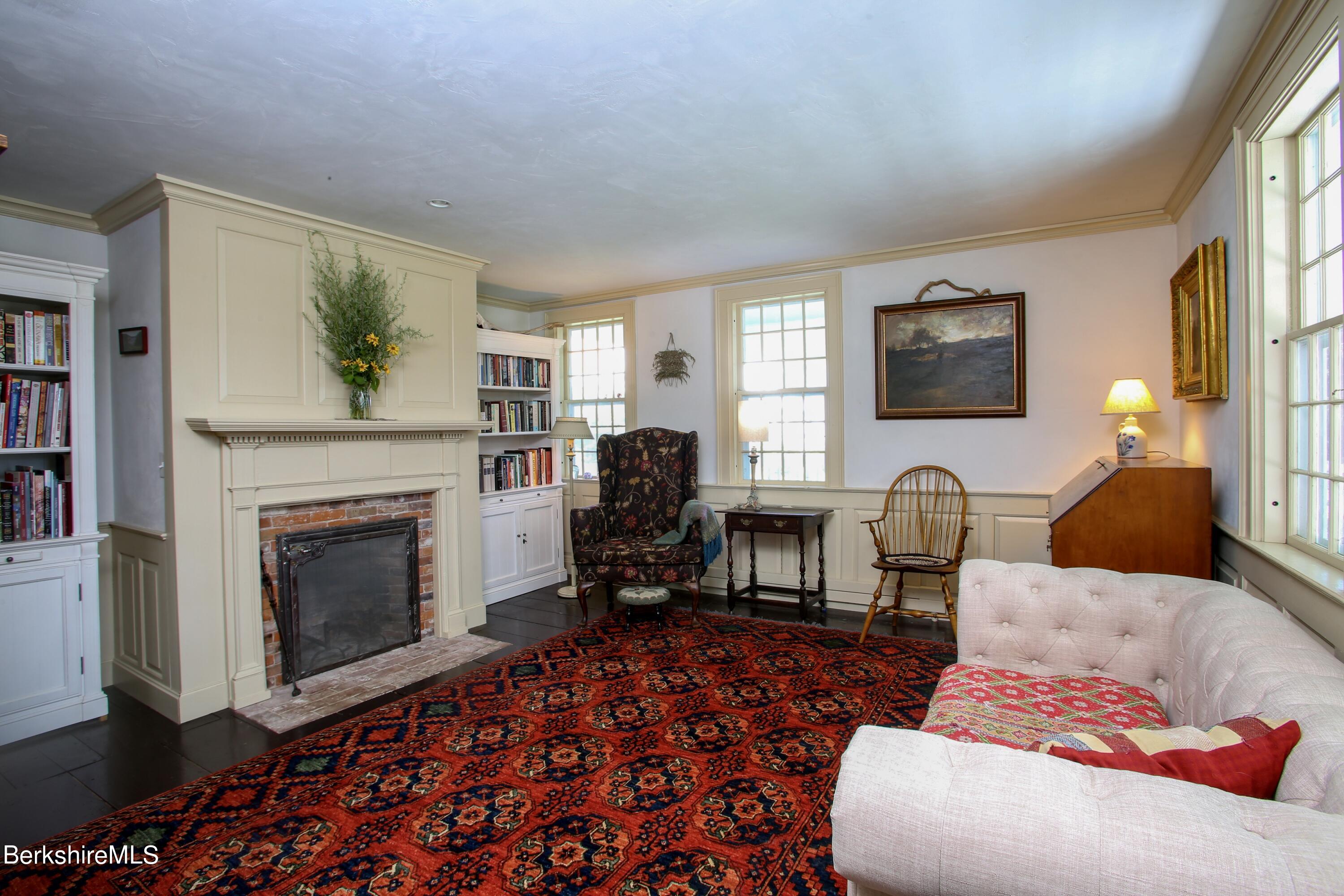 369 Bullitt Road Ashfield, MA 01330 - Photo 9 of 50 a living room with furniture windows and a fireplace