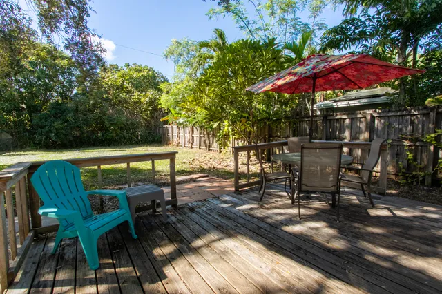a view of a chairs and table on the wooden floor