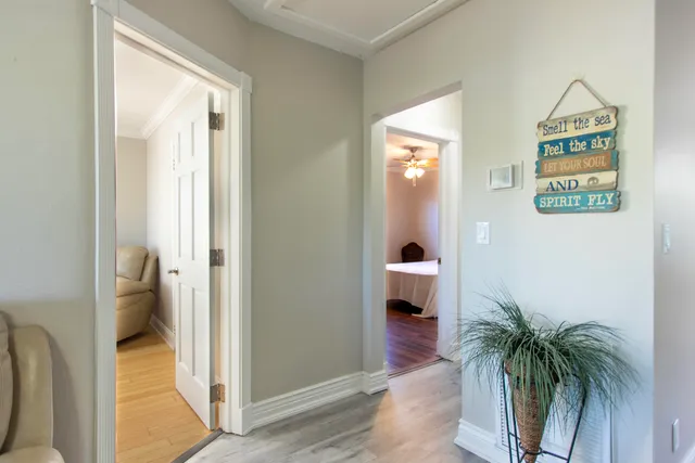 a spacious bedroom with a bed and a couch