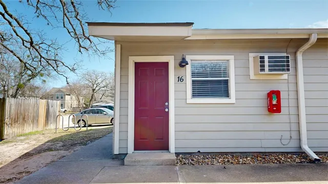 a view of a house with a street
