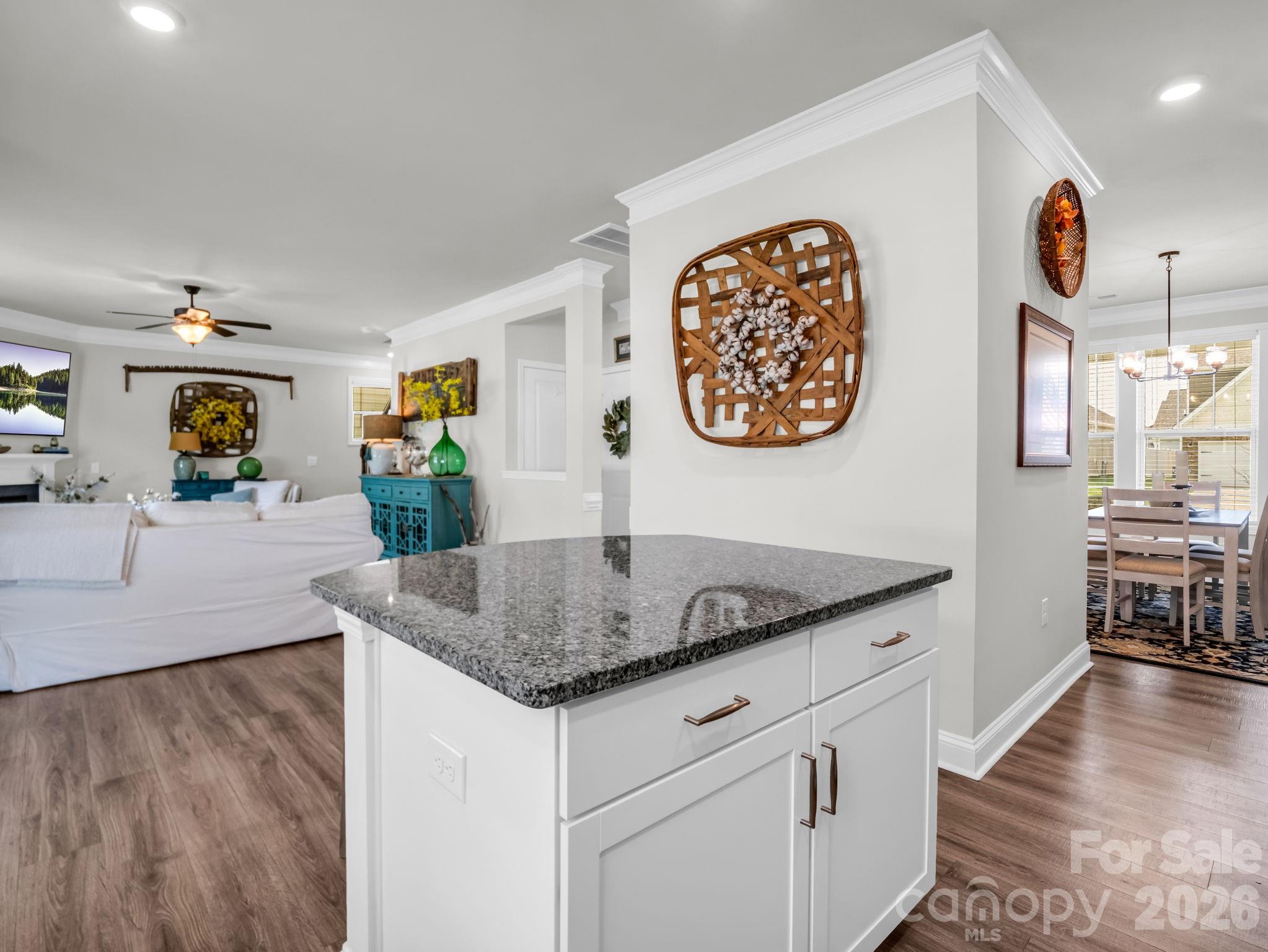 383 Fox Cove Road Hendersonville, NC 28792 - Photo 11 of 34 a kitchen with stainless steel appliances granite countertop a sink and a wooden cabinets